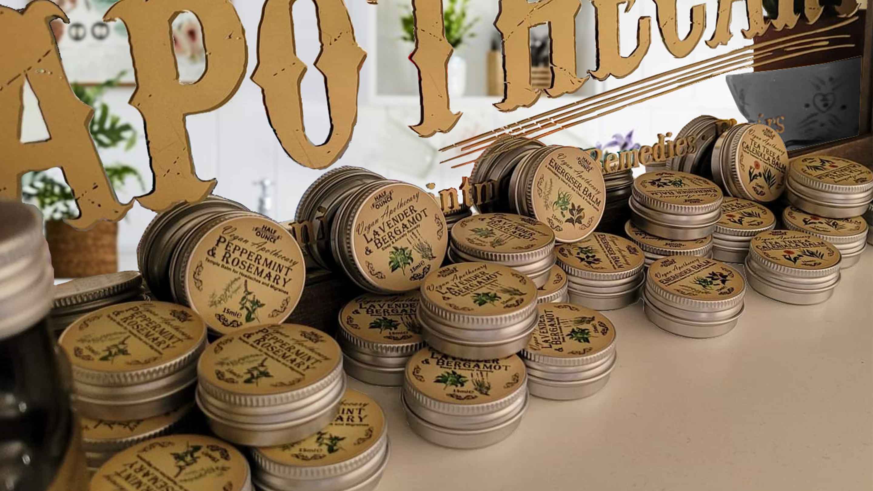 Collection of labelled cosmetic tins for lip balm