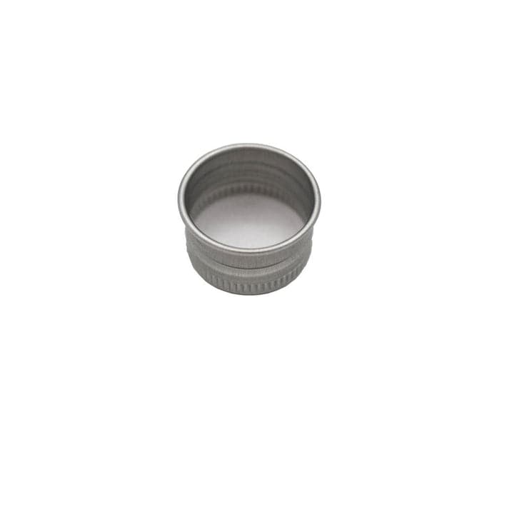 Screw lid cap photographed on its own and showing the inside..