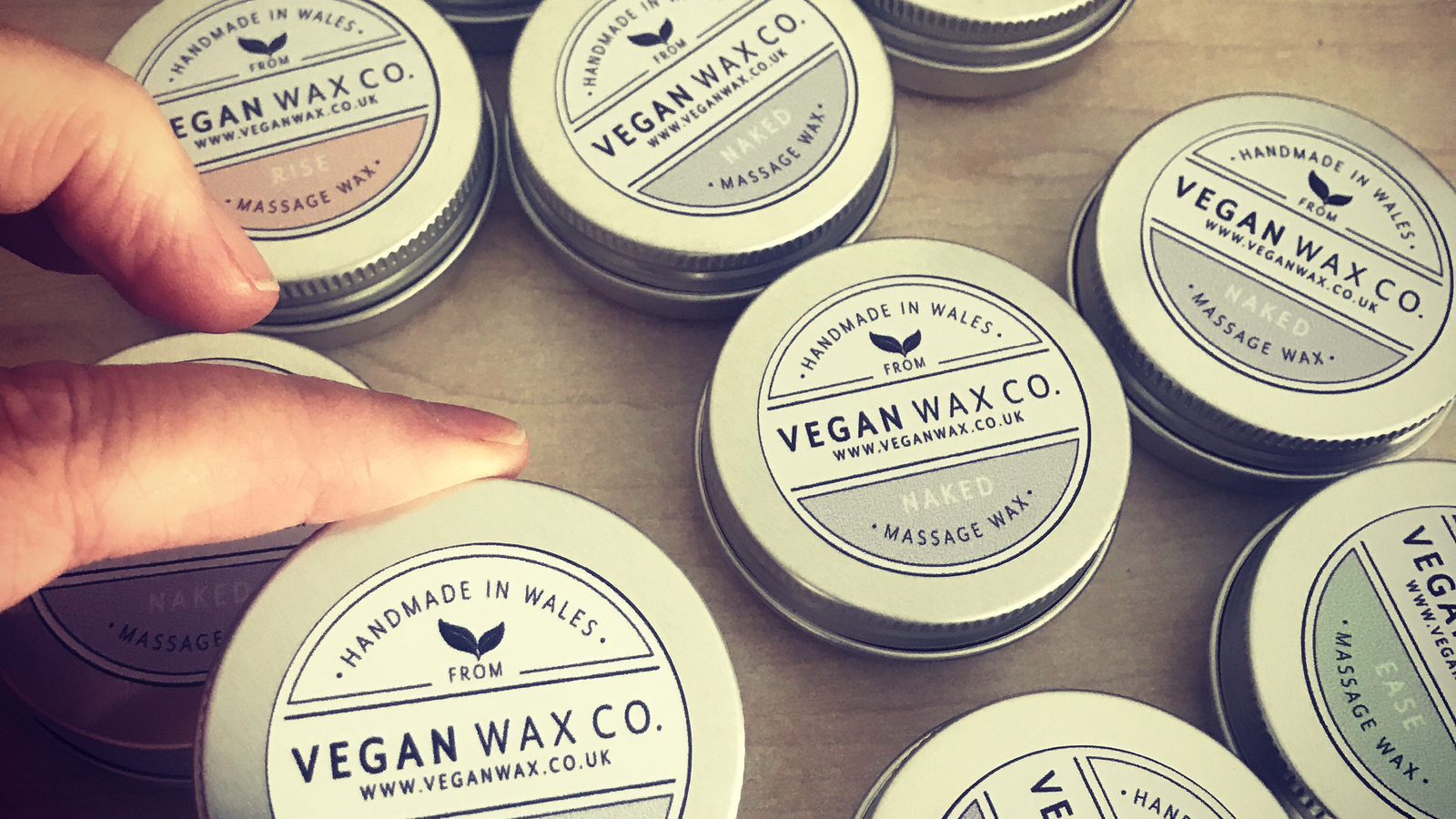 Vegan Wax Co. aluminium tin packaging being picked up and purchased.