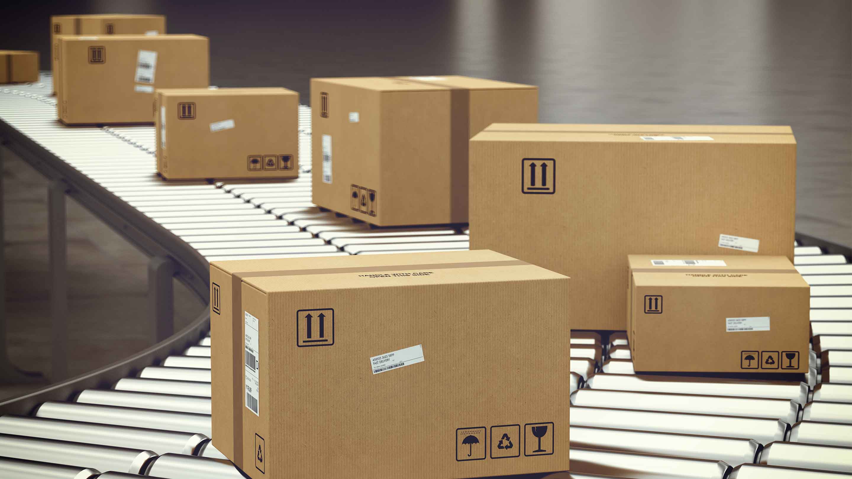 Business packaging on a conveyor belt.