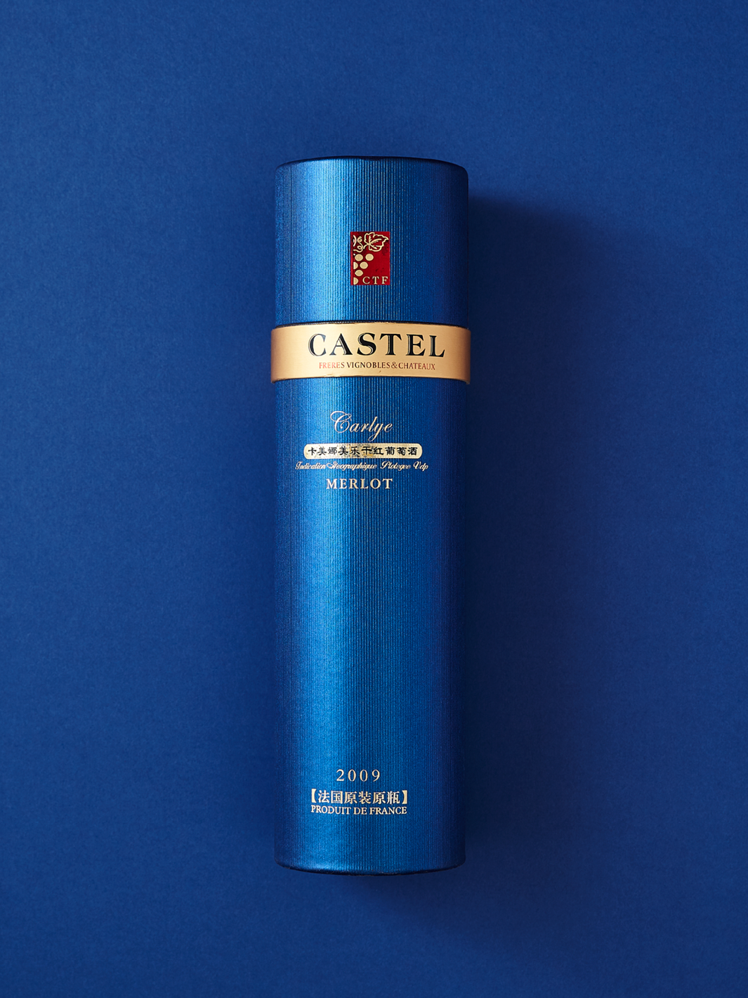 Blue cardboard tube packaging for Castel beverages.
