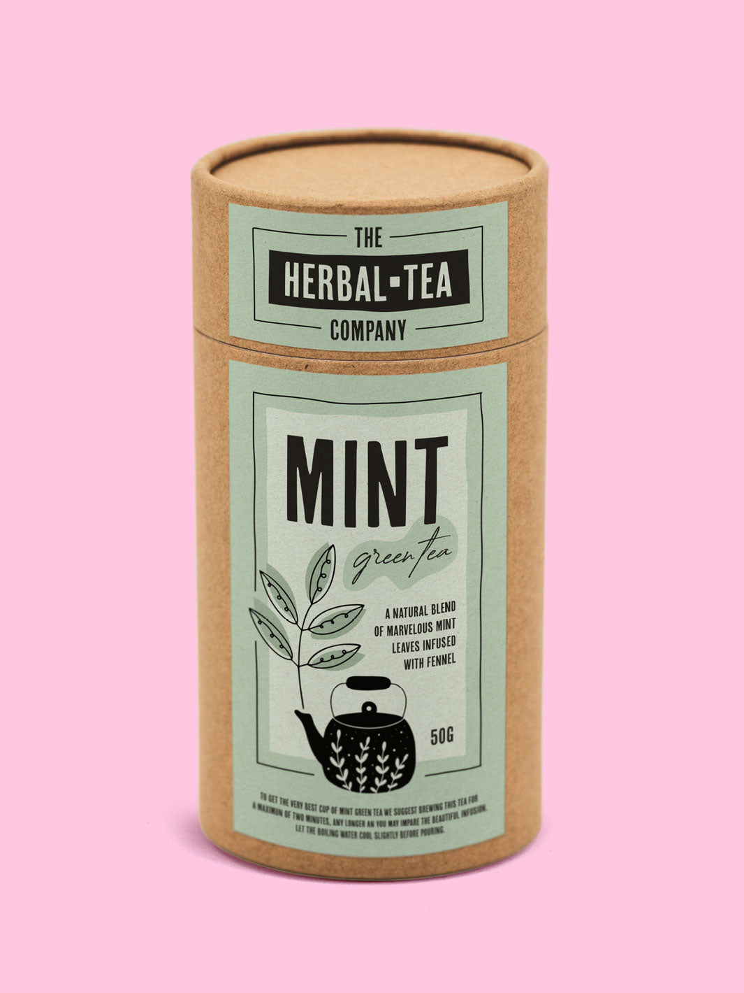 A picture of a cardboard tube packaging with a herbal tea label against a pink background.