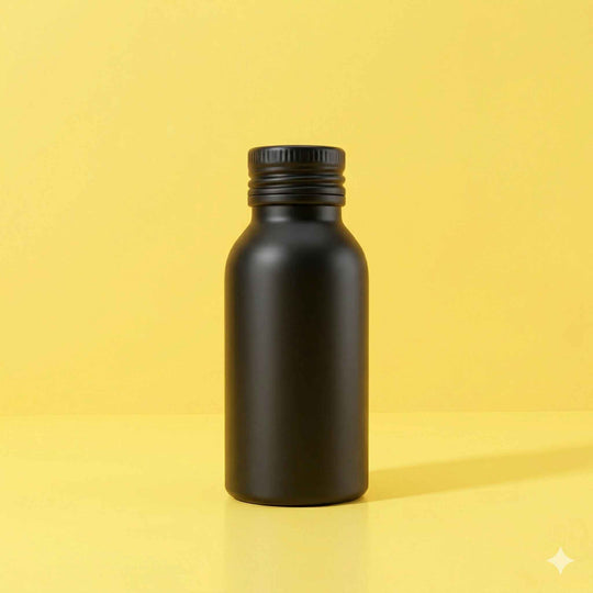 Black gloss bottle on a yellow background