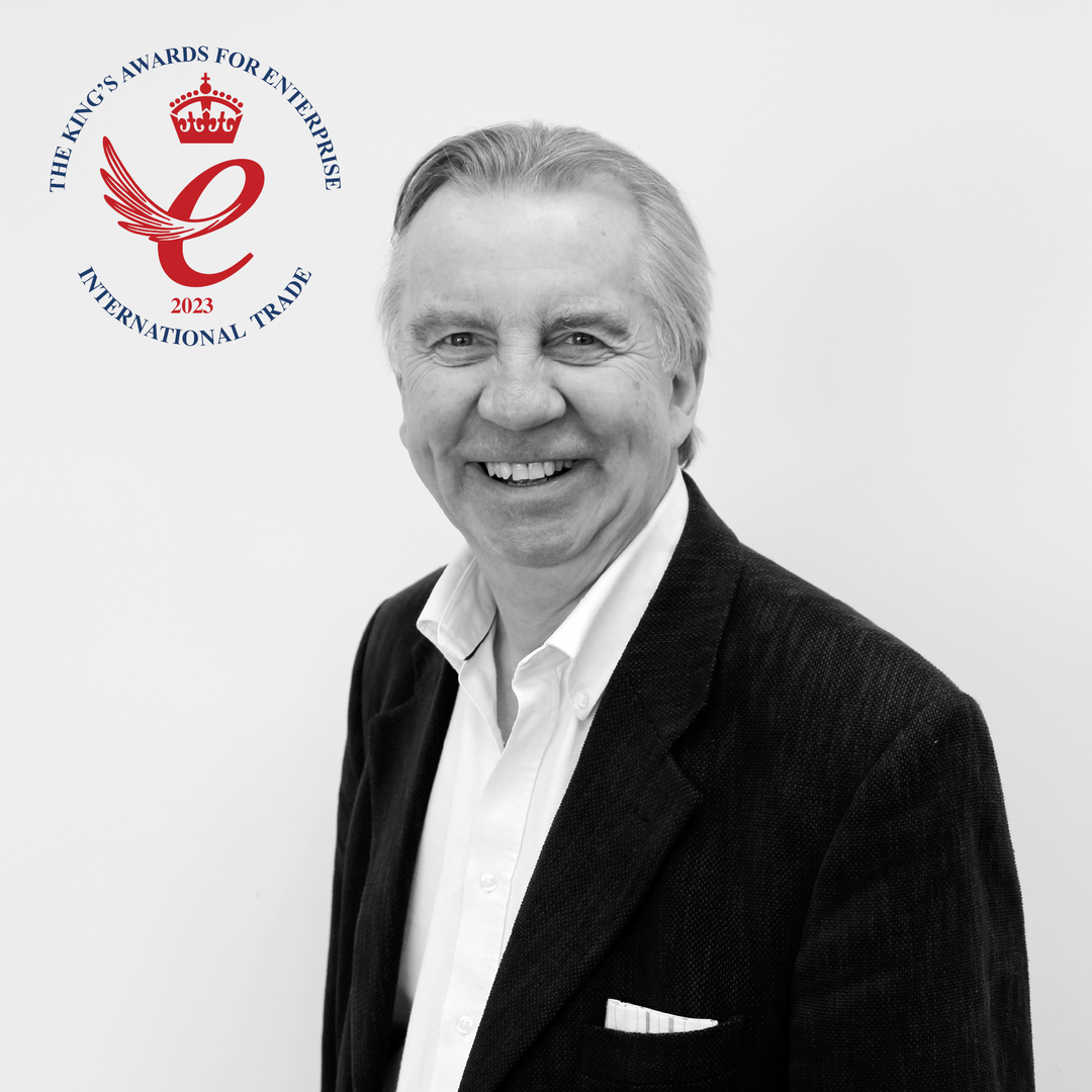 A portrait of Guy Grumbridge, chairman for Tinware Direct with the King's Award for Enterprise logo in the background.