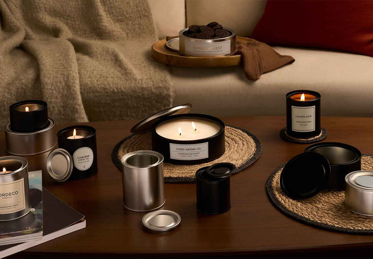 Lever lid tins with candles in living room. 
