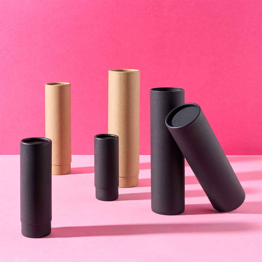 Collection of telescopic tubes on pink background. 