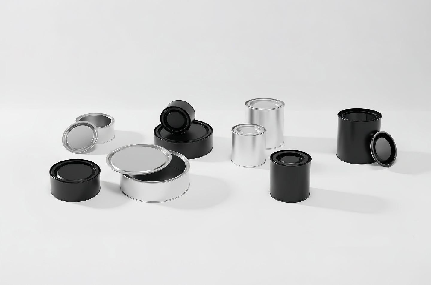 Variations of silver and black standard and wide premium lever lid tins on a white background. 
