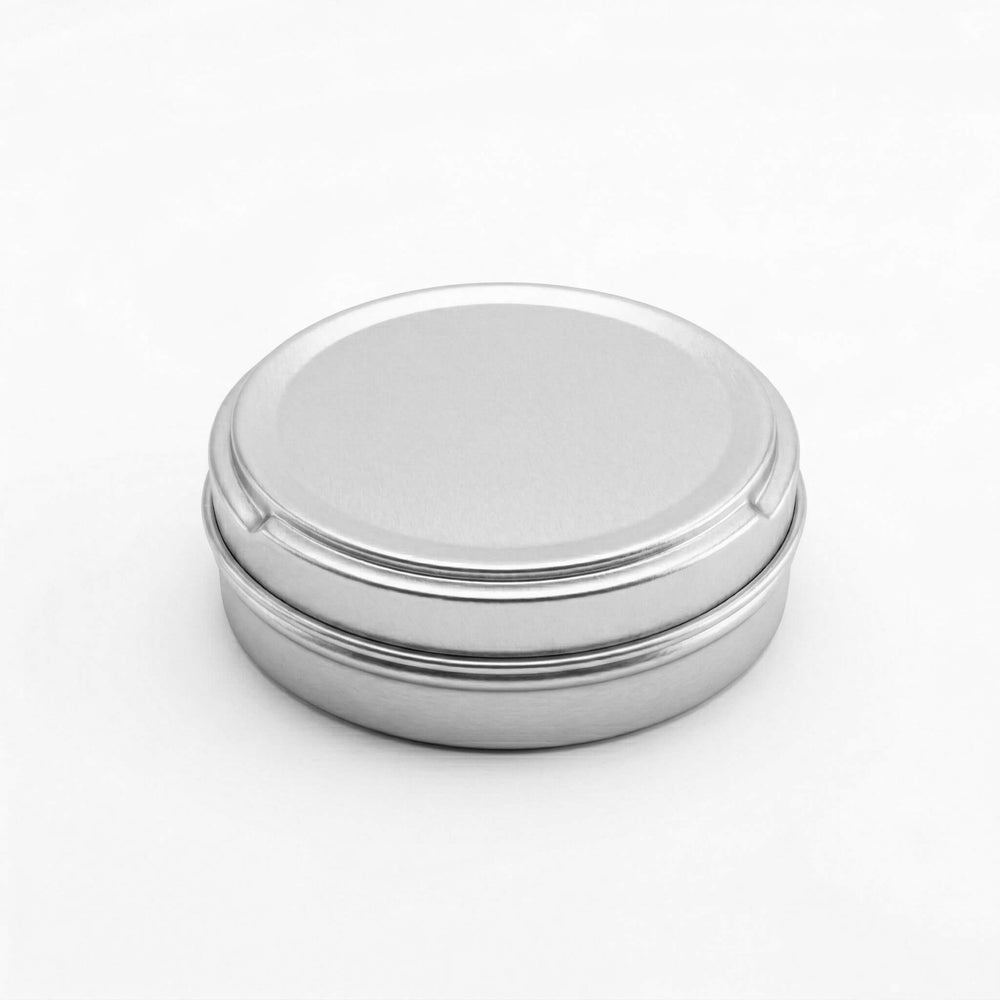 A seamless tin with push to open lid in silver with product code T0362.