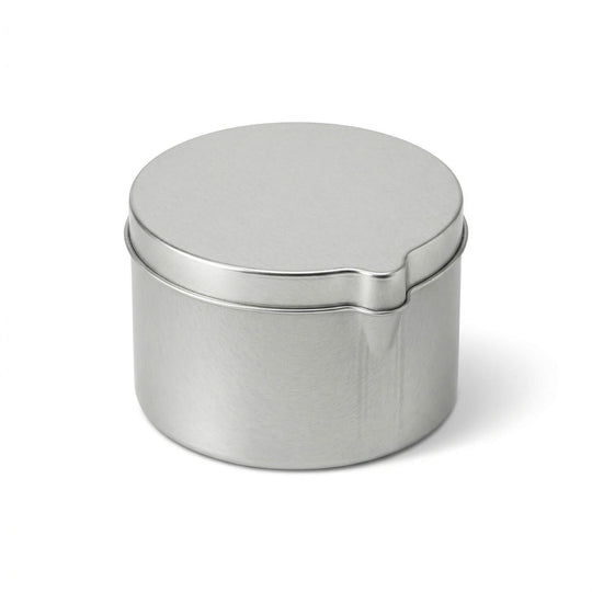 A seamless tin with pouring spout in silver.