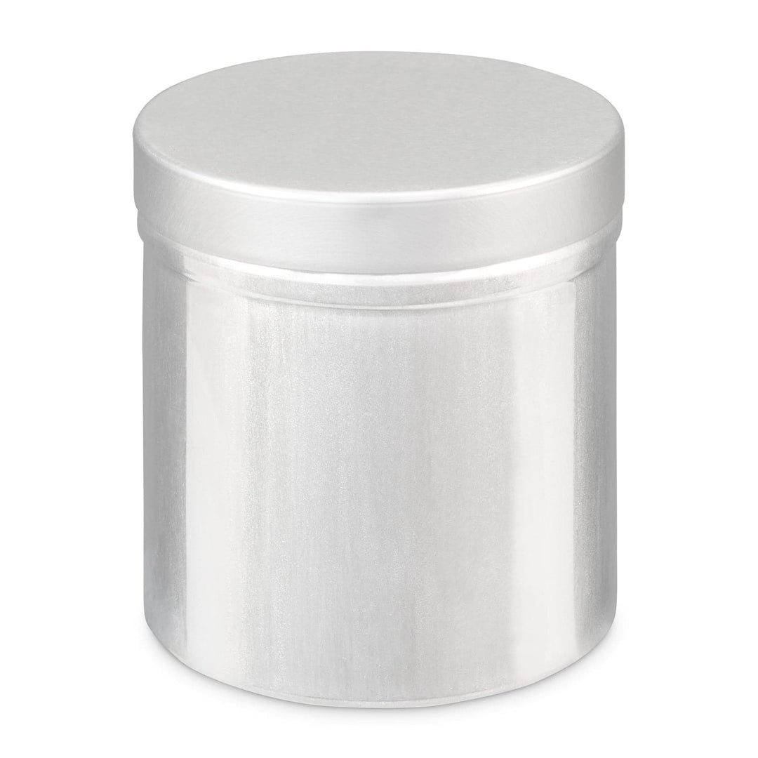 An uncoated metallic silver round tin container closed with a lid against a white setting
