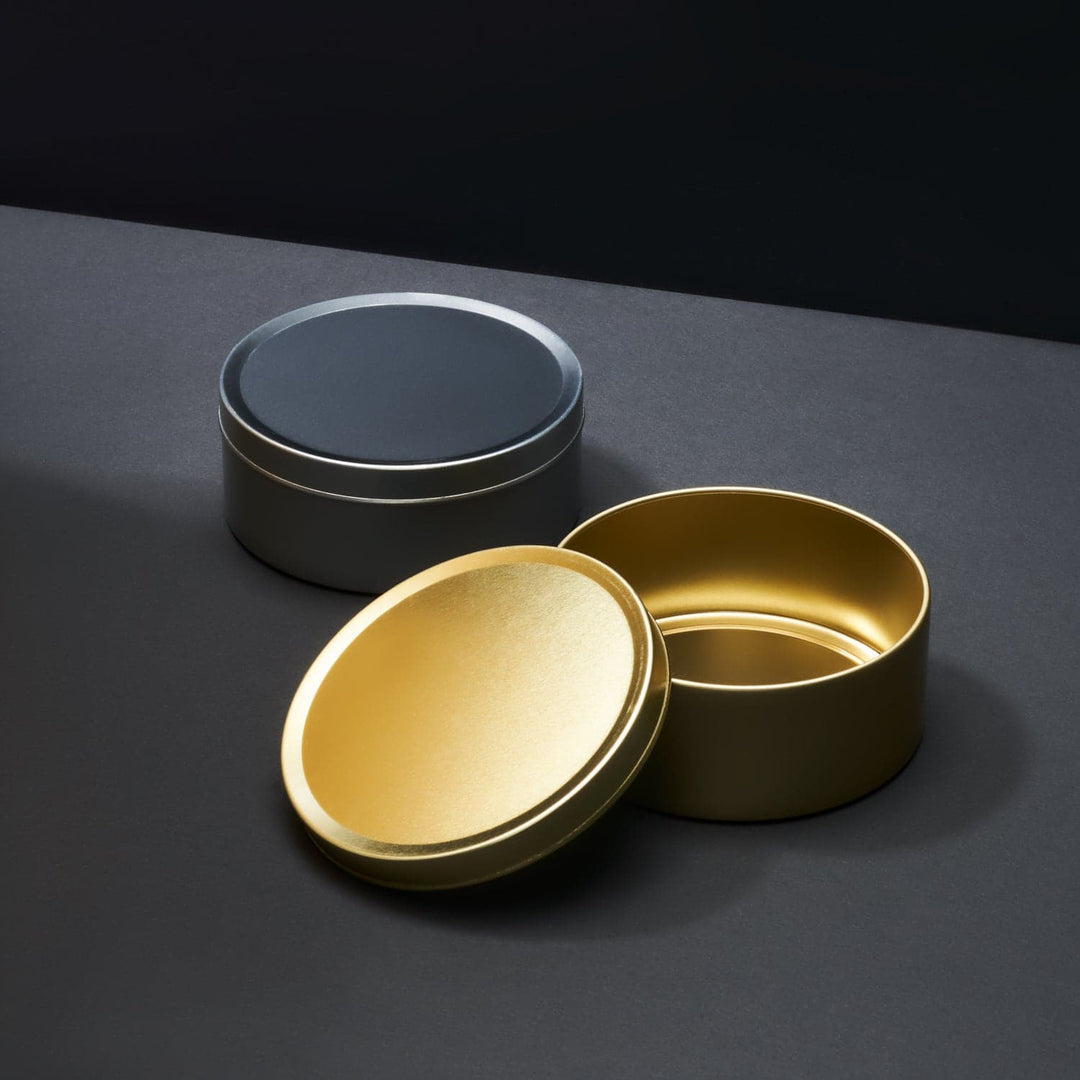 Silver and gold travel sweet style tins. Seamless with the lid off the gold tin.
