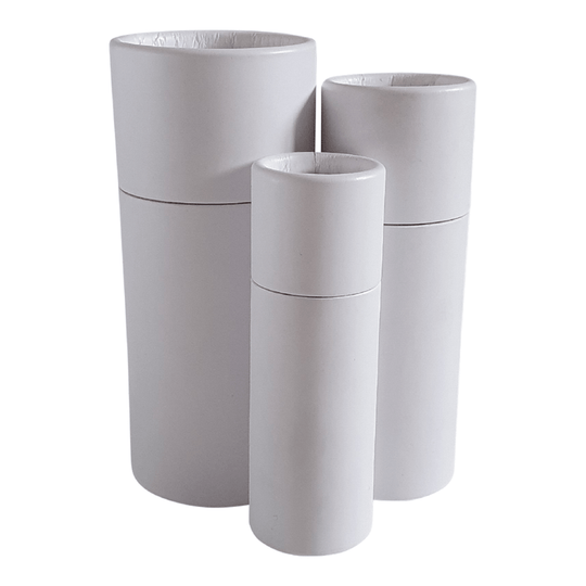 Three sizes of white cardboard push-up base tubes with internal water resistant lining.
