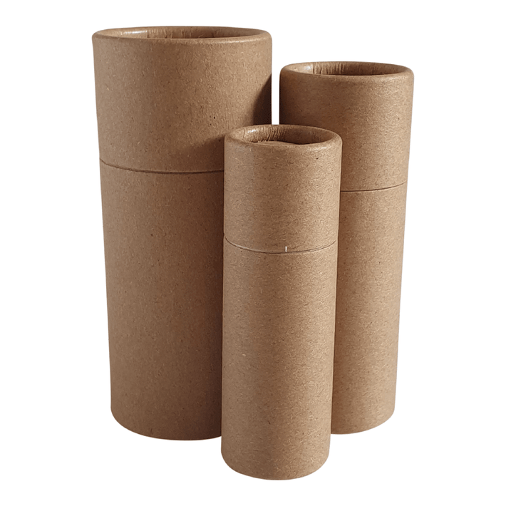 Three sizes of brown cardboard push-up base tubes with internal water resistant lining.