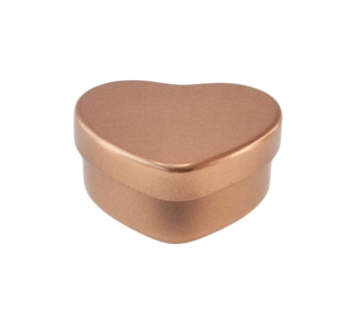 A rose gold coloured heart shaped tin with product code T5622.