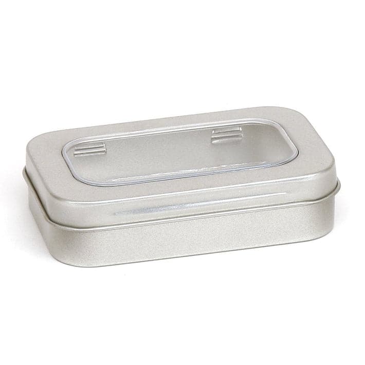 A rectangular tin in silver with a hinged window lid.