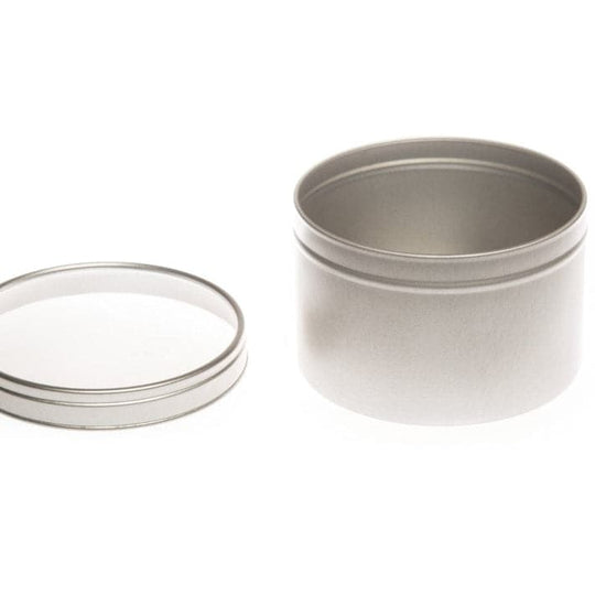 A round silver tin with a clear windowed slip lid with product code T0708W and lid removed.